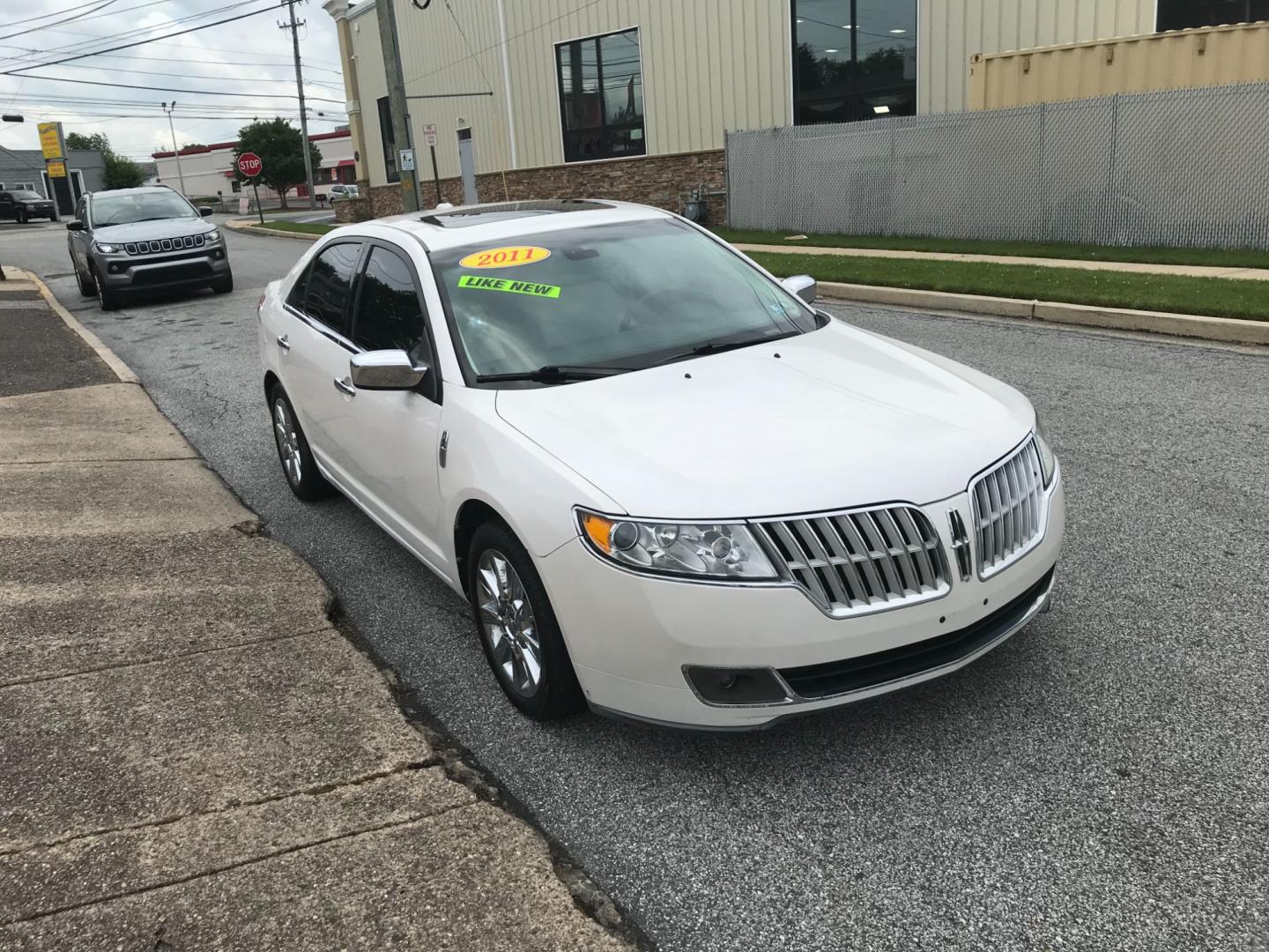 2011 White /Cream Lincoln MKZ (3LNHL2JC4BR) with an 3.5 V6 engine, Automatic transmission, located at 577 Chester Pike, Prospect Park, PA, 19076, (610) 237-1015, 39.886154, -75.302338 - 2011 Lincoln MKZ: Only 108k miles, navigation system, AWD, backup camera, sunroof, new PA inspection, runs LIKE NEW! This vehicle comes inspected and has been given a bumper to bumper safety check. It is very clean, reliable, and well maintained. We offer a unique pay plan that is known for being - Photo#3